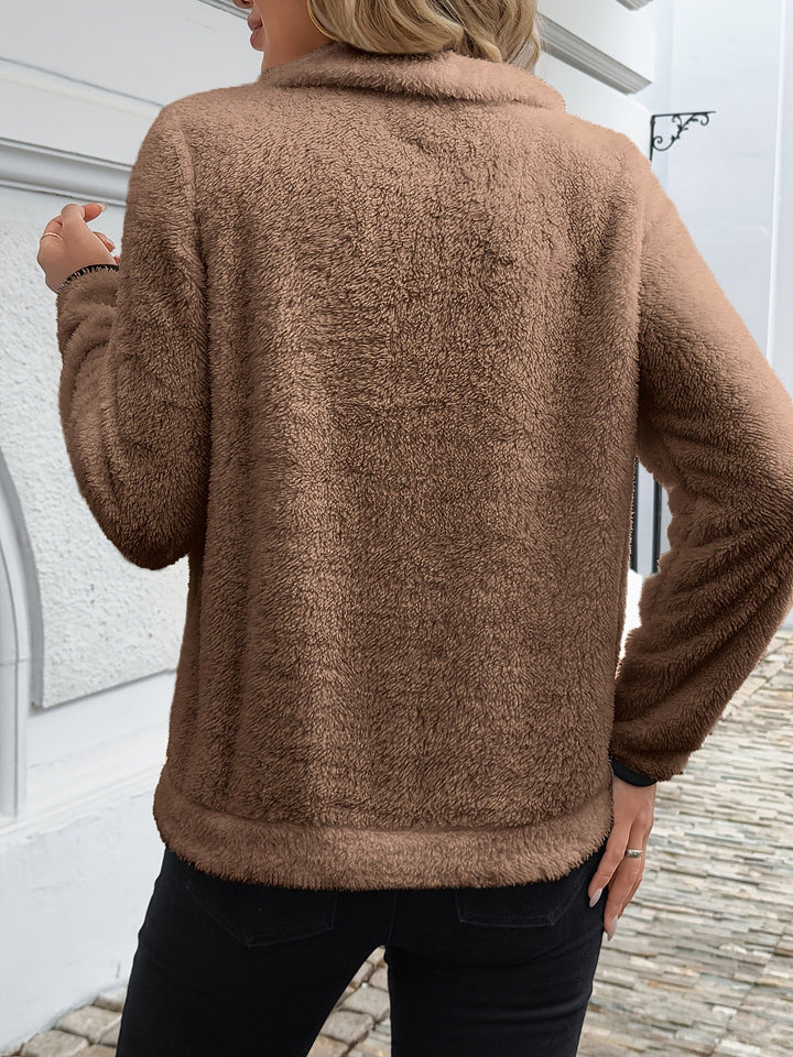 Julia | Comoda felpa con zip a metà